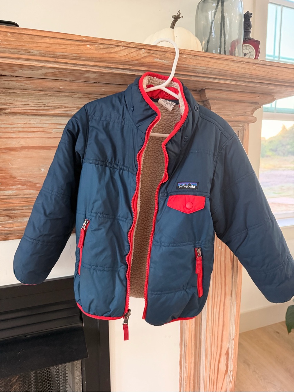 Patagonia Kids Navy Reversible Tribbles Puffer Jacket with Red Trim